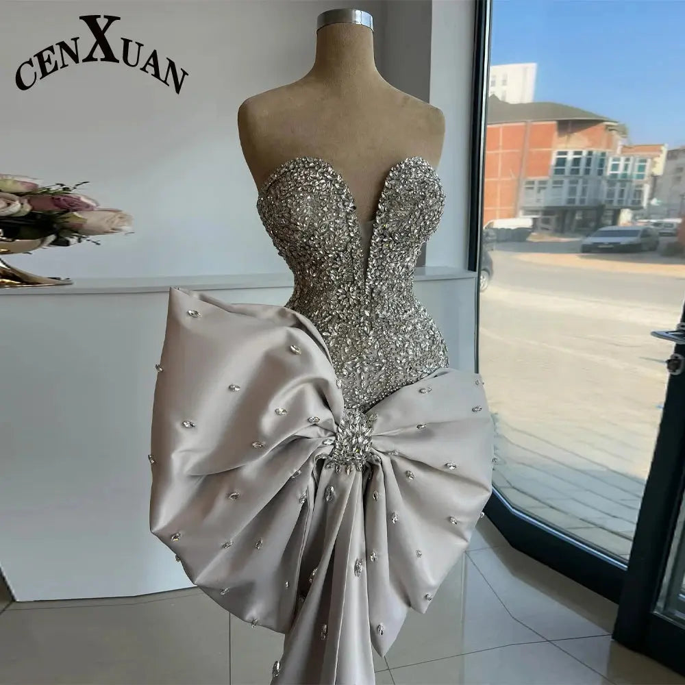 Rhinestone Bow Gala Dress in elegant black with a sweetheart neckline and sparkling bow detail.
