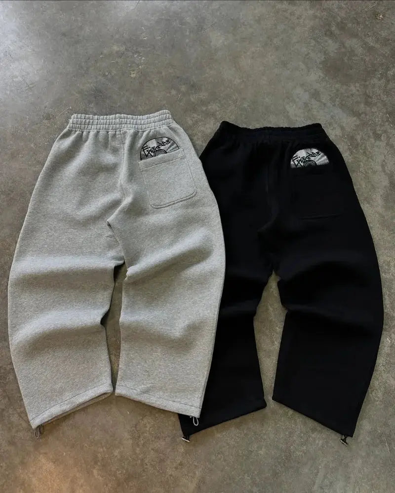 Side view of Urban Pulse Tracksuit, highlighting street-ready design and distinctive embroidery.