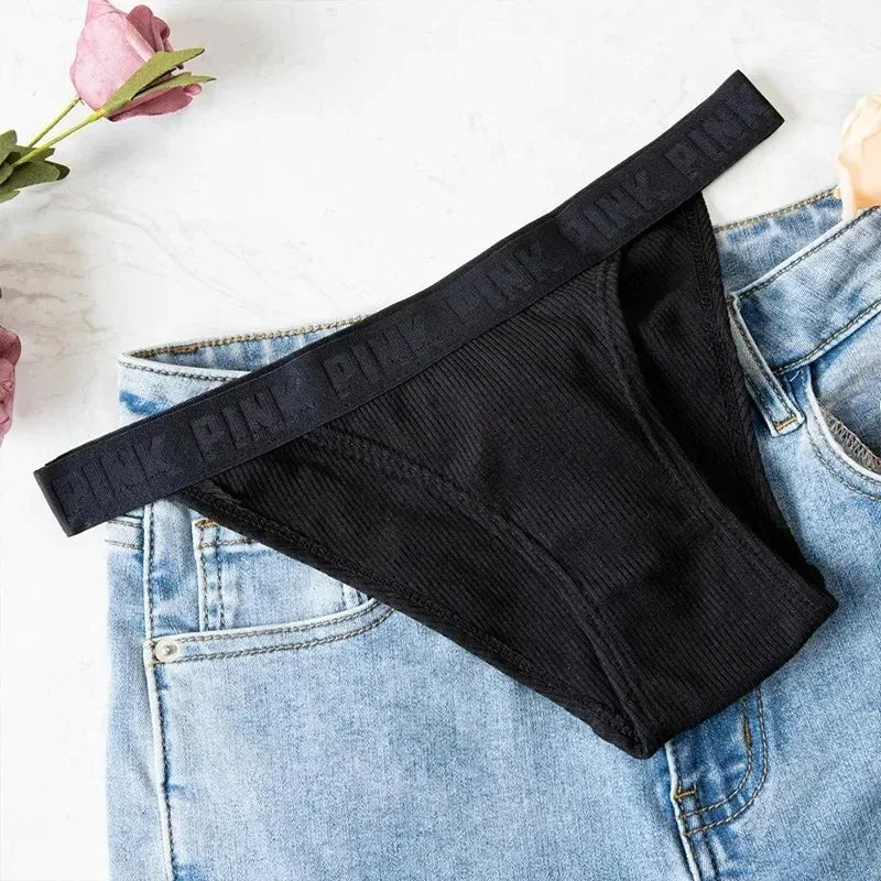 Model wearing low-rise briefs under dress showing invisible comfort and coverage