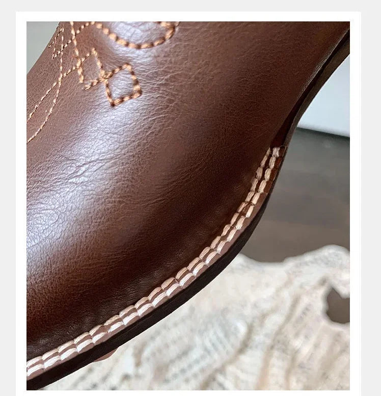 Mid-calf Western boots showcasing intricate embroidery and comfortable square toe design