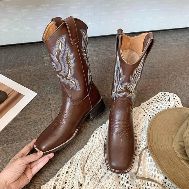 Embroidered leather Western boots with square toe design and pull-on style