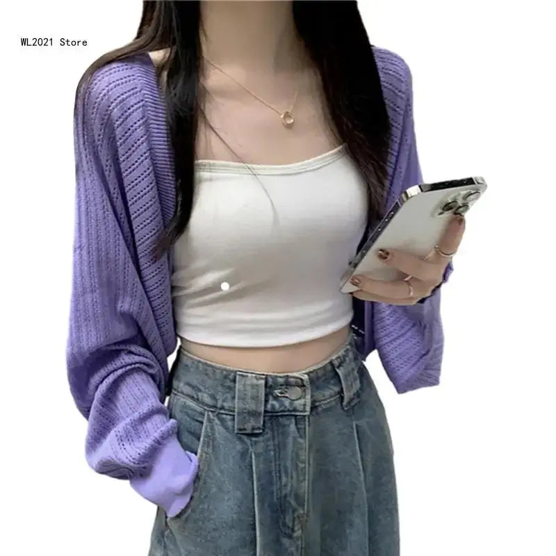 Soft white cropped cardigan showcasing a lightweight design, perfect for transitional seasons.