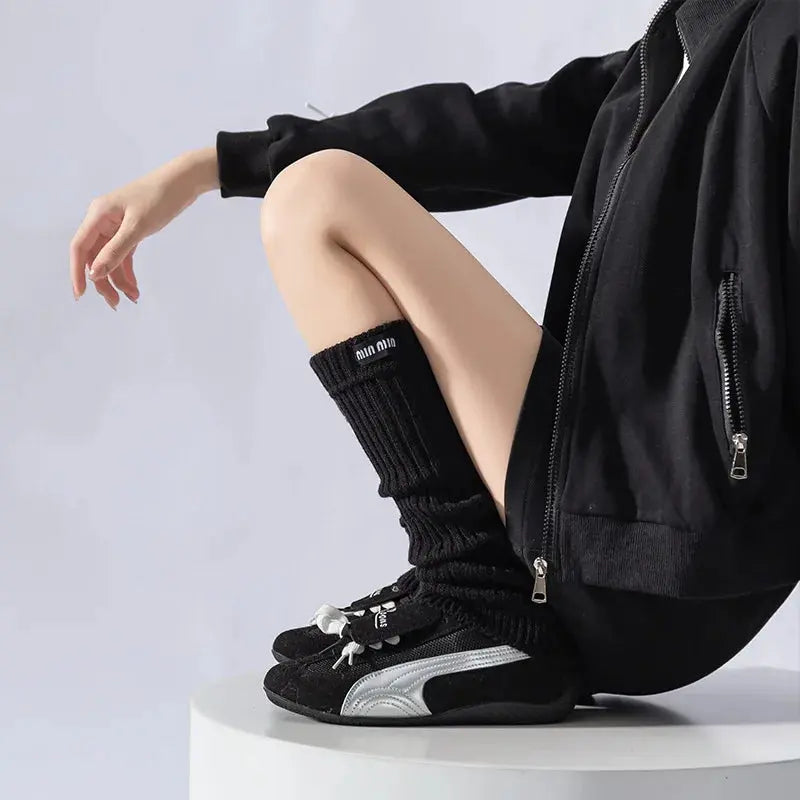 Warm acrylic socks in soft gray, perfect for chilly breezy evenings.