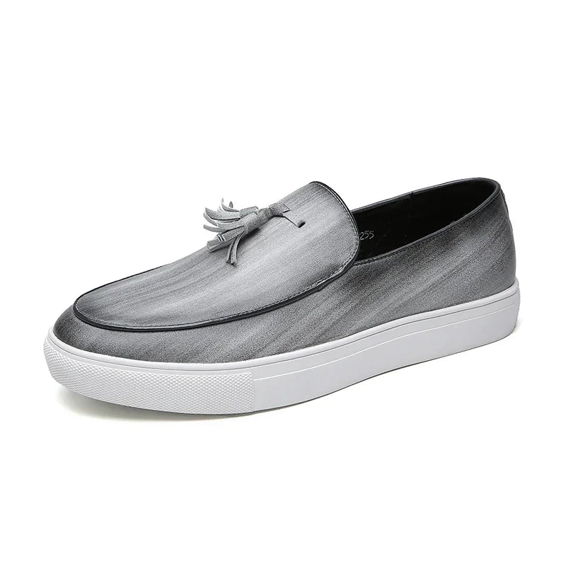 Close-up of waterproof leather material on men's dress loafers