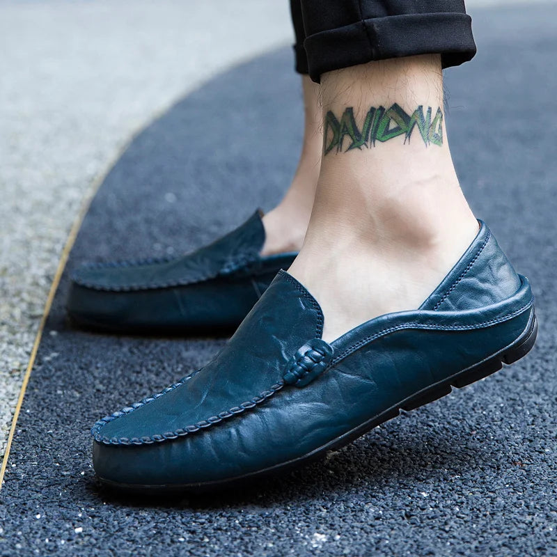 Close-up of the molded footbed in handcrafted leather loafers for all-day comfort.