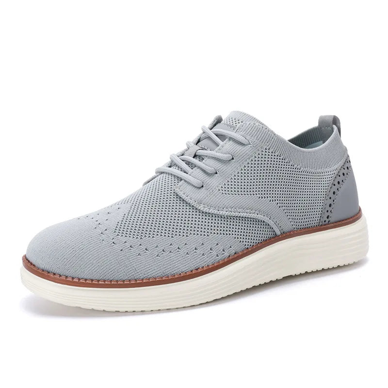 Overhead view of lightweight men's sneakers with breathable mesh uppers and lace closure