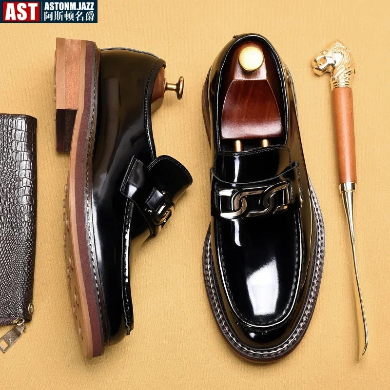 Pair of genuine leather loafers shown from top angle highlighting slip-on design