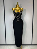 Strapless diamond gown in shimmering fabric, showcasing intricate beaded detailing.