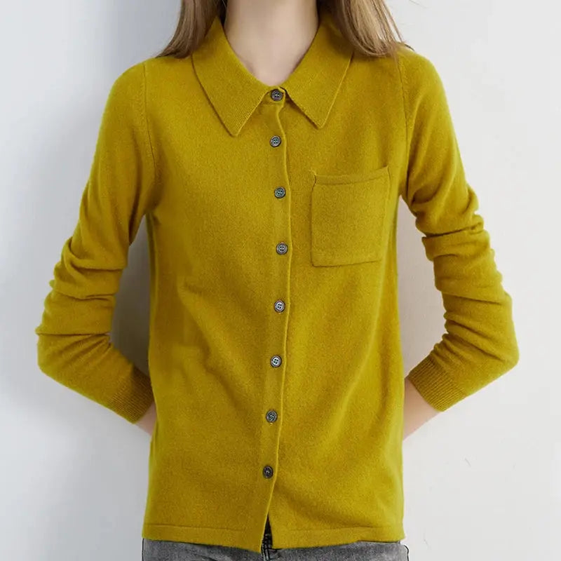 Detail shot of the fine yarn used in the Merino wool cardigan, showcasing its lightweight feel.