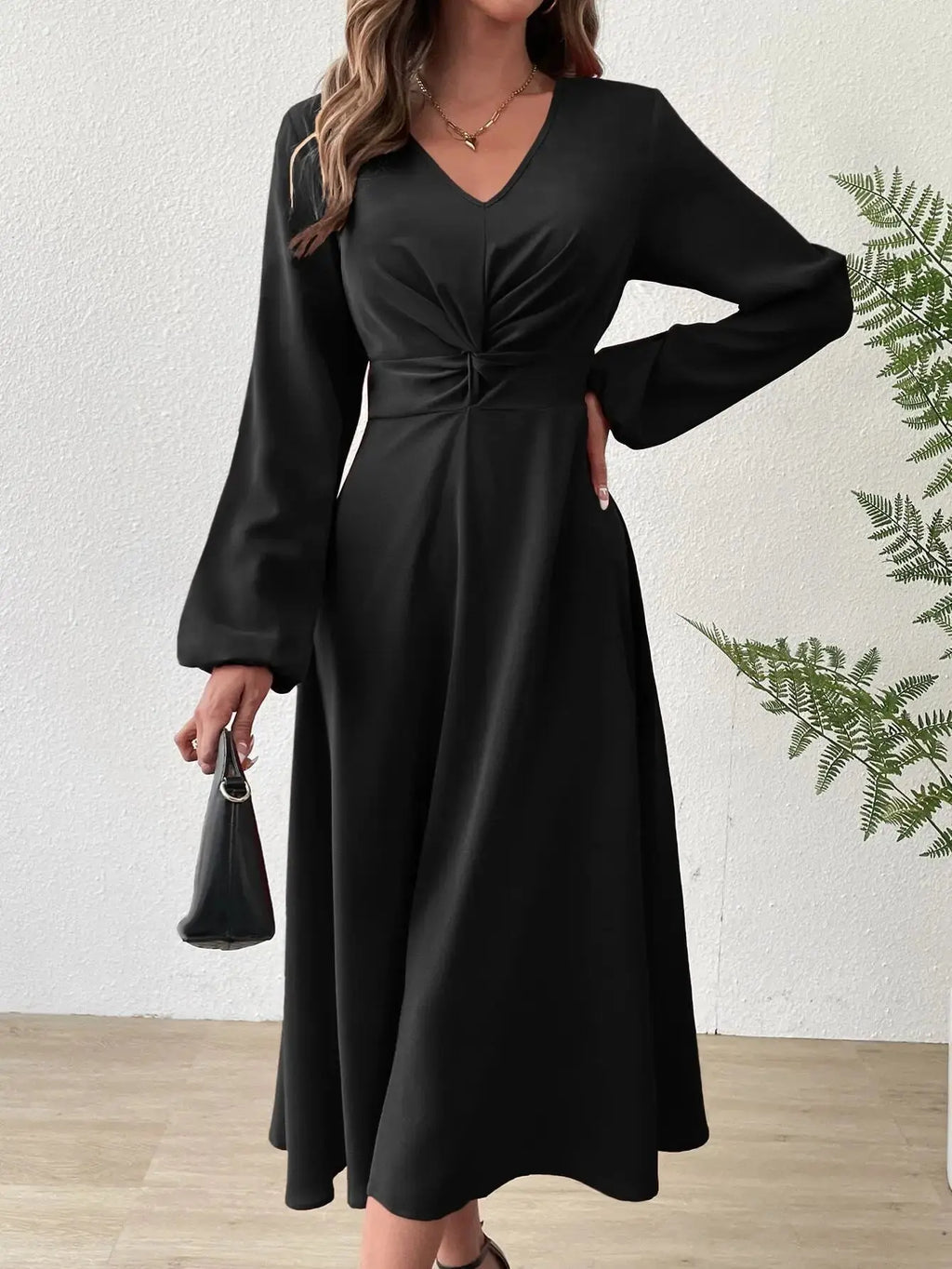 Elegant v-neck design of the Midnight Allure dress showcasing flattering fit and silhouette.