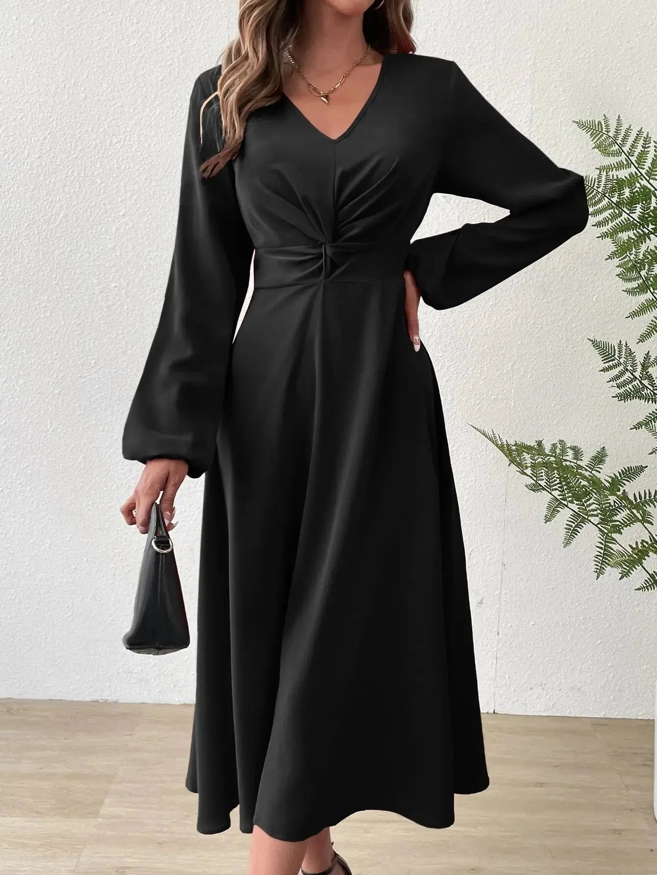 Elegant v-neck design of the Midnight Allure dress showcasing flattering fit and silhouette.