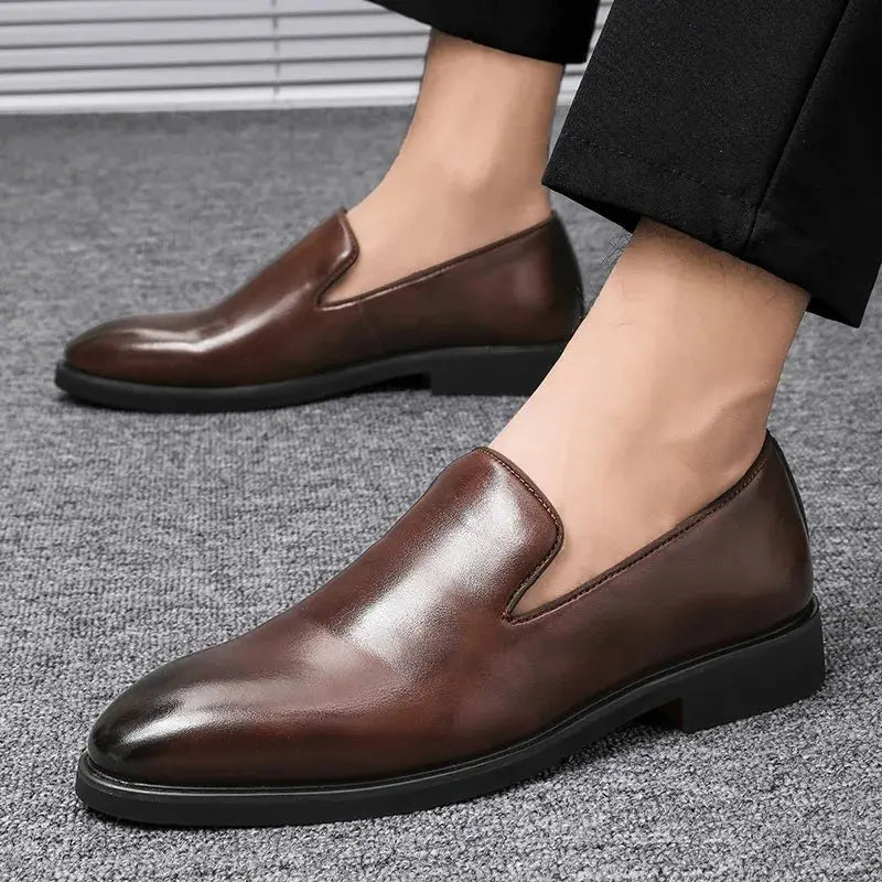 Professional men's loafers with distinctive red bottom sole and comfortable cushioned footbed for all-day wear