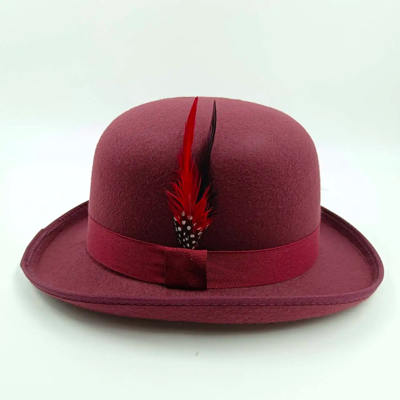Elegant black fedora paired with formal attire, showcasing its statement accessory quality.