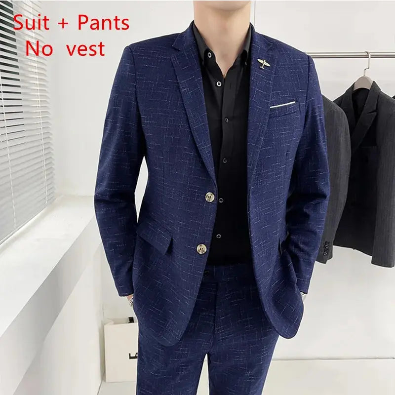 Back view of the wedding suit highlighting the expert tailoring and polished finish.