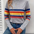 Flat lay of the Radiant Stripes Tee, featuring its soft texture and eye-catching stripes for everyday wear.