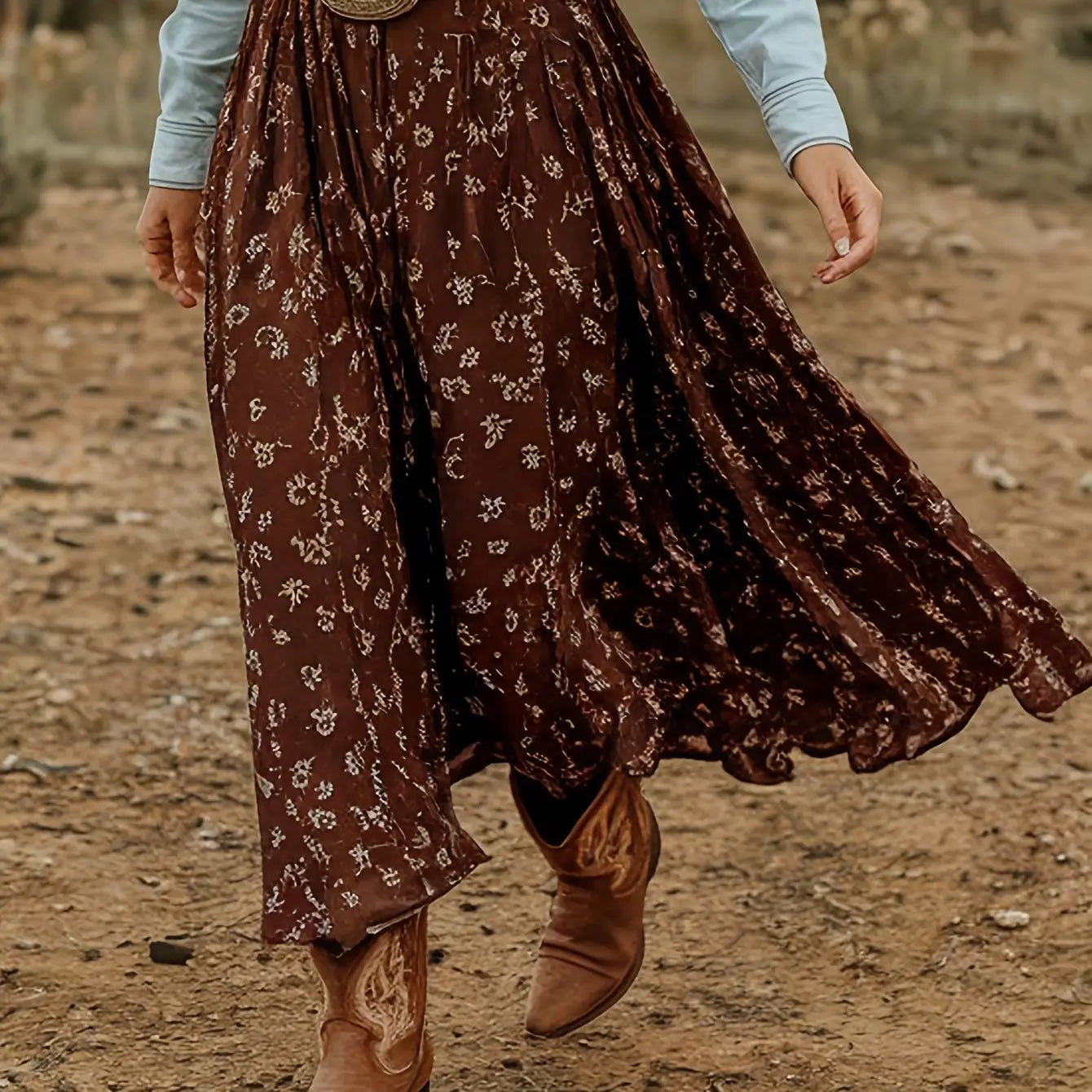 Close-up of the floral pattern on a high-waist denim skirt, perfect for casual outings and festive gatherings.