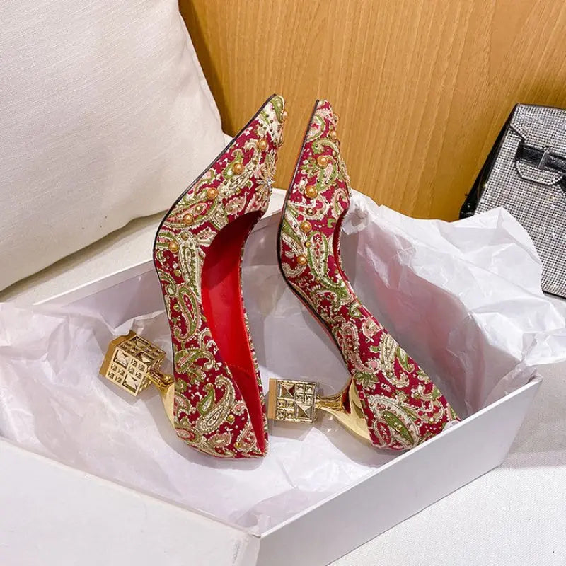 Elegant white embroidered bridal shoes with mid-height block heels.