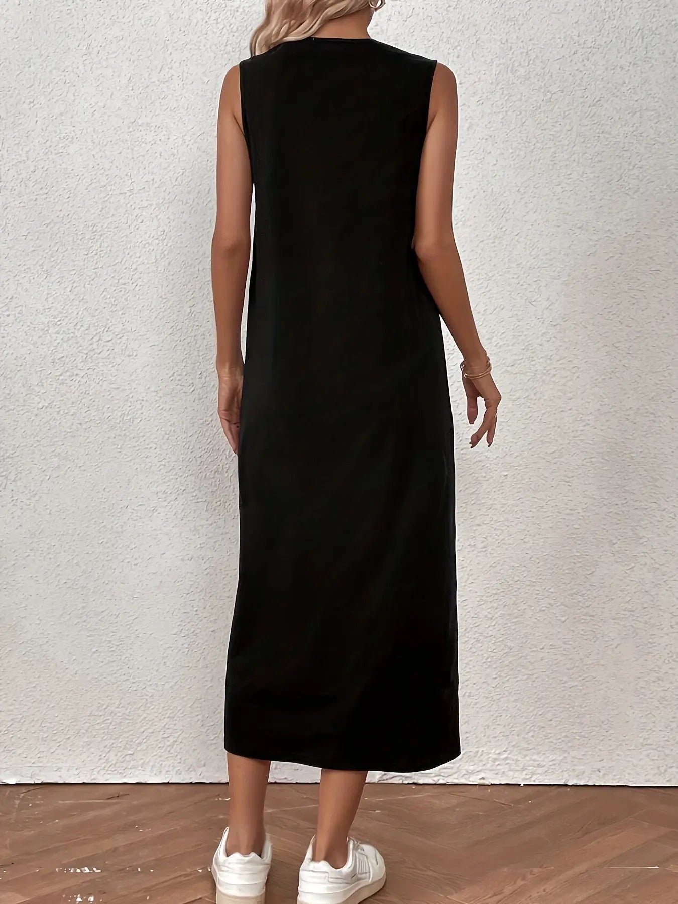 Close-up of the soft, stretch-infused fabric of the Midnight Whisper Maxi, highlighting its comfort and elegance.