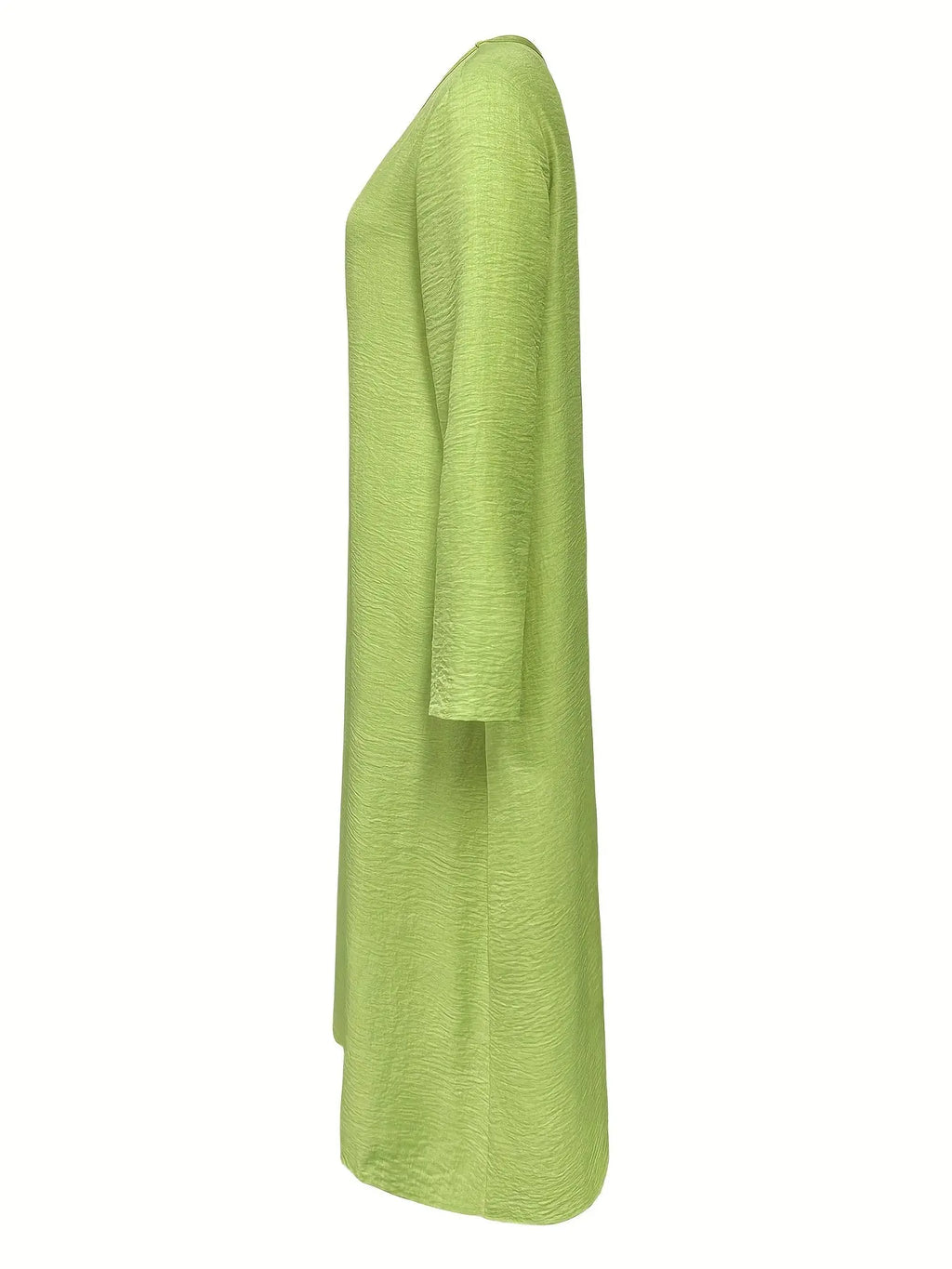 Model twirling in the Whisper-Soft Olive Dress, demonstrating its graceful A-line silhouette.