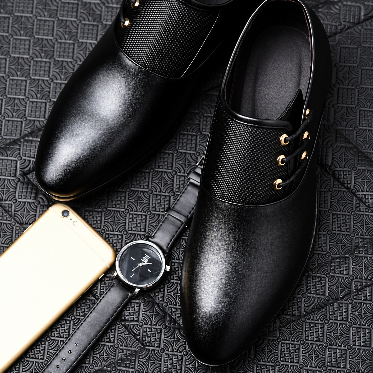Black men's Oxford dress shoes flat lay